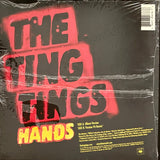 TING TINGS, THE - "Hands" album version / Passion Pit remix [2013] 7" single, orange marbled vinyl. USED