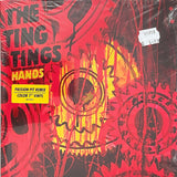 Vinyl record cover with red and black design and text